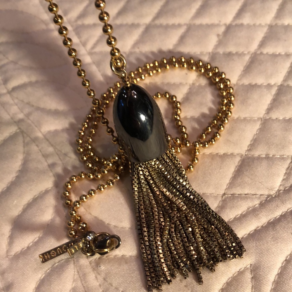 Lele Sadoughi Long gold tone beaded chain with chrome hood on gold chain tassels